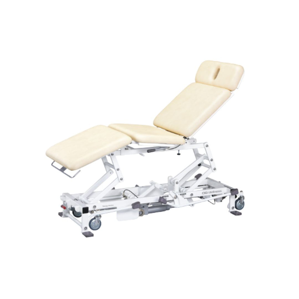 OG Wellness treatment table UA-740 UA-790 with padded surface and adjustable height for medical or therapy use.